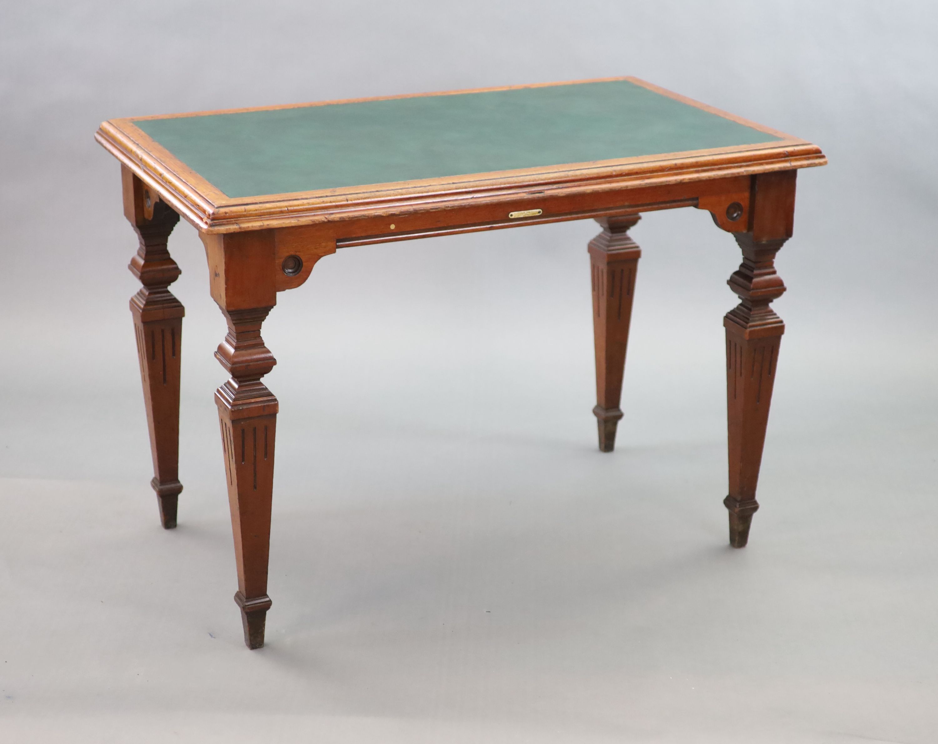 A Victorian mahogany library table, supplied by Sage & Co. Shopfitters of London, W.113cm D.69cm H.78cm